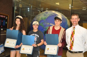 Winning students and their teacher (left to right):